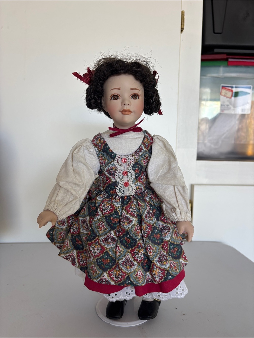Collectible musical porcelain doll by Paradise Galleries or similar maker.